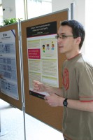 Michal Zíma presenting his poster at Poster competition.